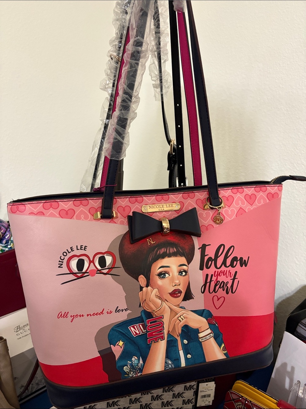 Nicole Lee Pink Graphic Tote with Bow Accent and Gold Charm